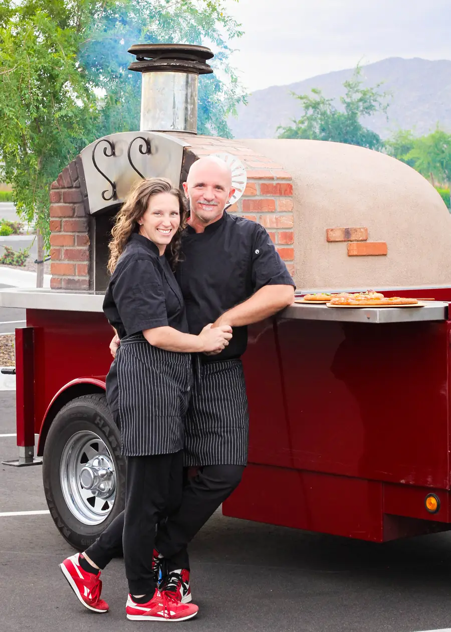 Jamin and Christie Dunn with the Local Hive wood-fired oven